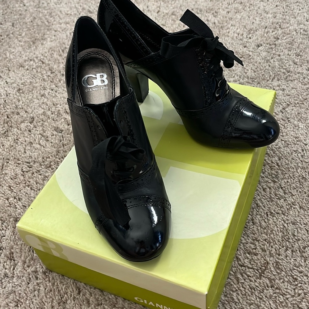 Black patten leather booties
